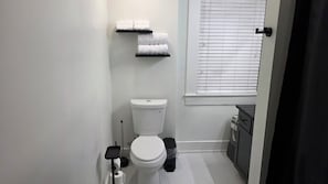 Hair dryer, towels, soap, toilet paper