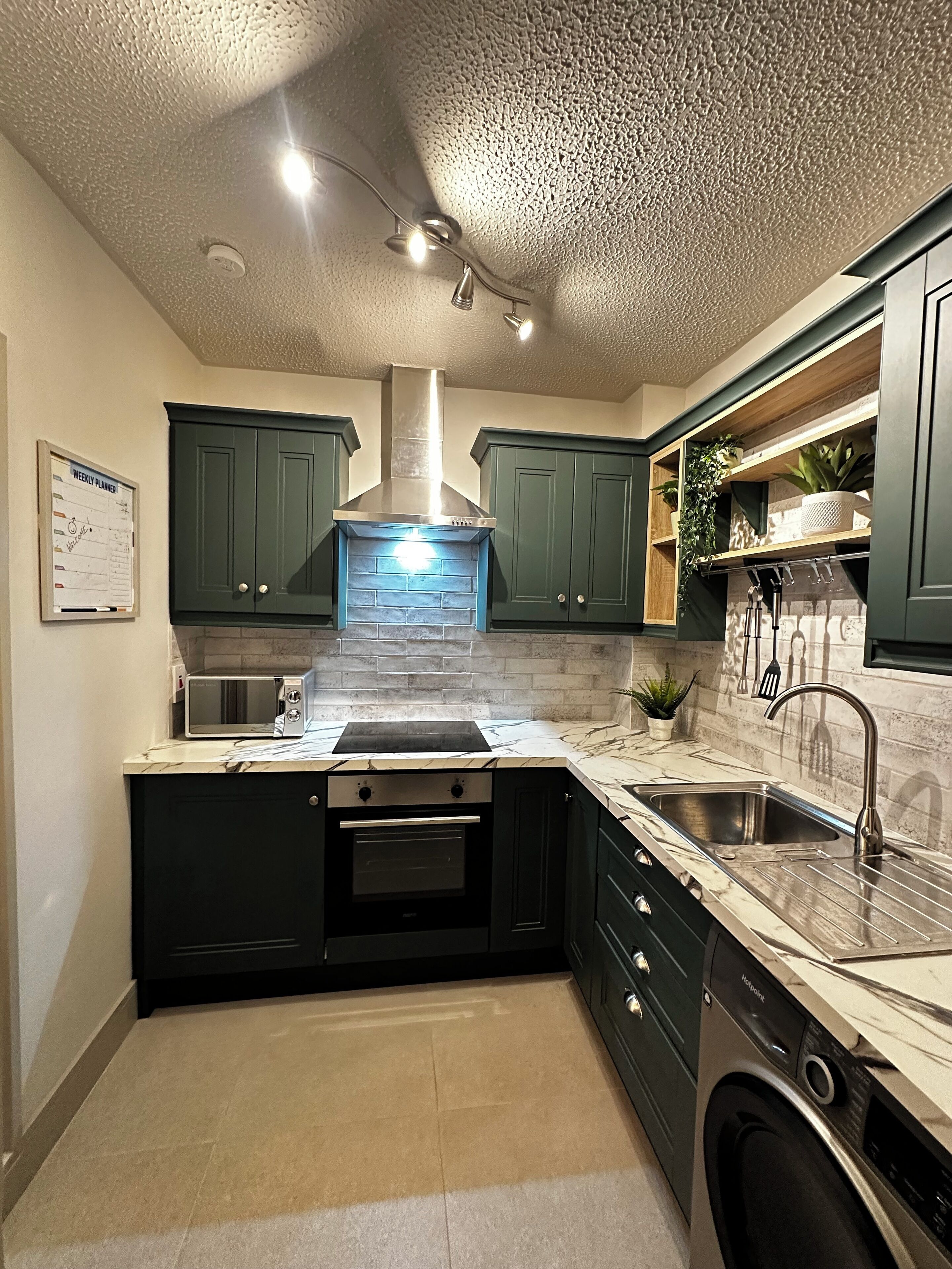 Refrigerador, microondas, horno y parrilla de estufa 