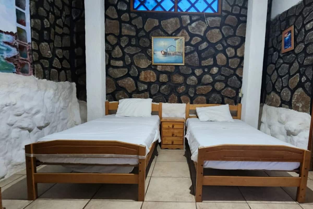 Down duvets, laptop workspace, bed sheets