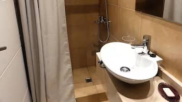 Shower, bidet, towels, soap