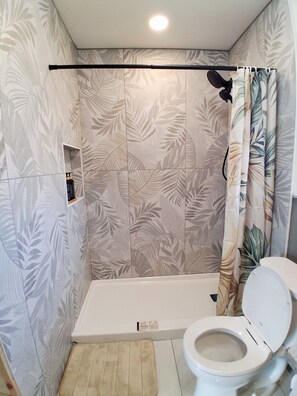 Shower, towels, soap, shampoo