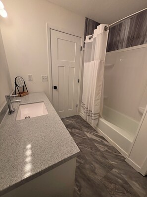 Hair dryer, towels, soap, toilet paper