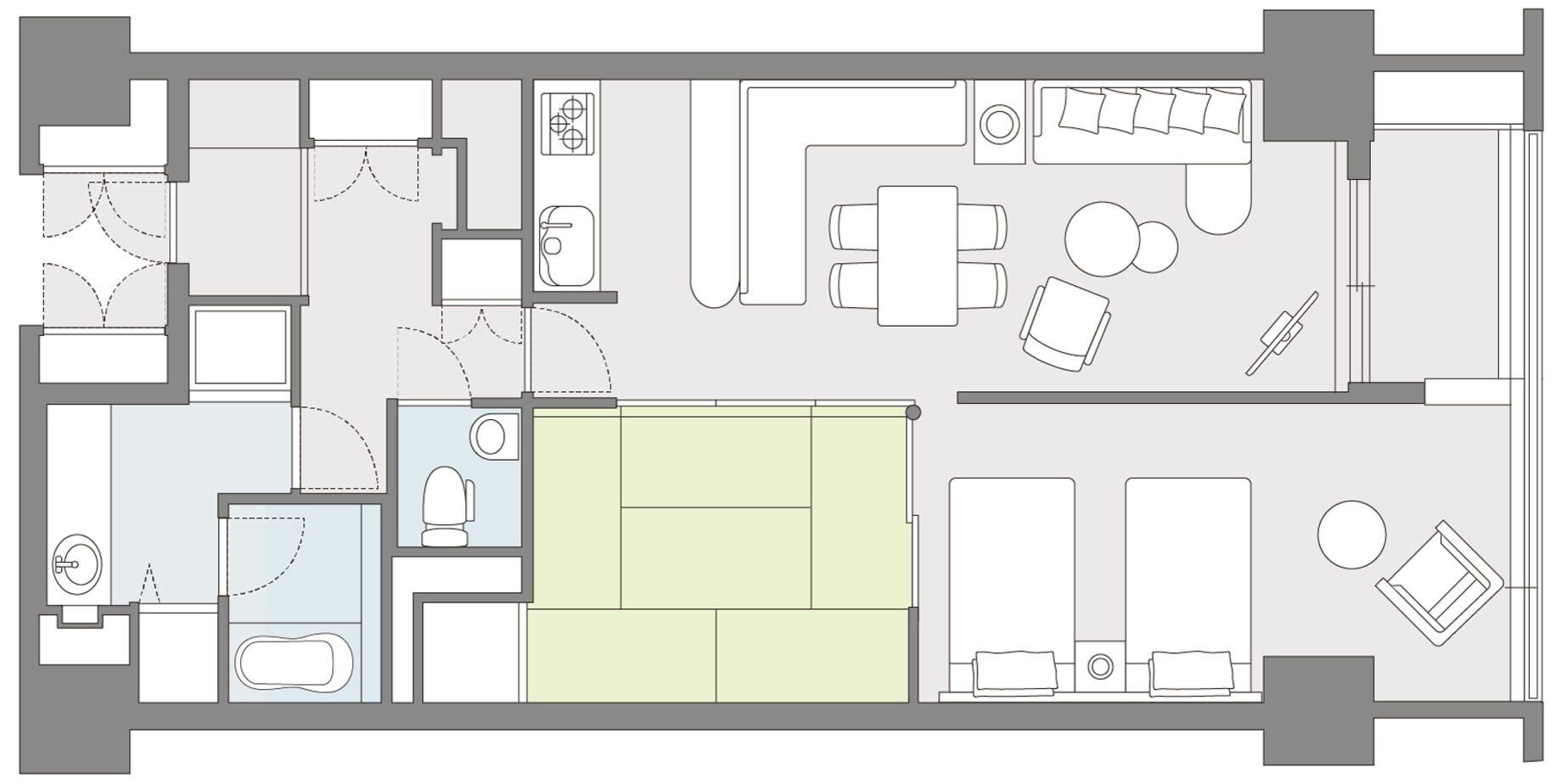 A hotel floor plan with multiple rooms, a kitchen, and a dining area.