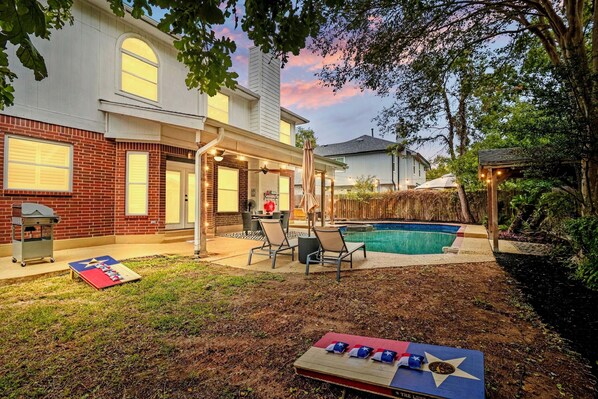 Outdoor pool, a heated pool - Family Friendly- 5BR - Pool & Hot Tub-Game Room & Playhouse- Fenced Yard-Firepit (Cedar Park)