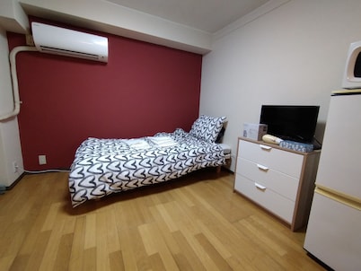 A hole in the ground downtown! 208 Fully equipped kitchen & rooms for long term stays