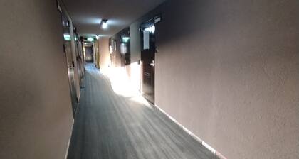 A hole in the ground downtown! 208 Fully equipped kitchen & rooms for long term stays