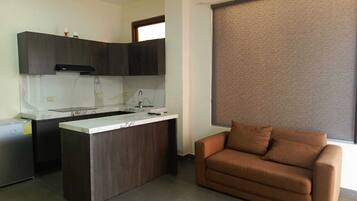 Suite estàndard, vistes a la piscina | Sala d'estar