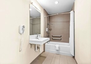 Combined shower/tub, hair dryer, towels, soap