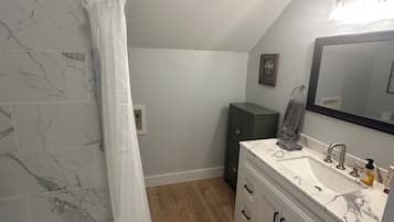 Hair dryer, towels, soap, shampoo