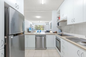 Fridge, microwave, oven, stovetop - Budget Beachside Ground Floor Resort pool spa @201 (Coffs Harbour)