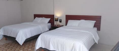 Suite, 2 Queen Beds | Free WiFi