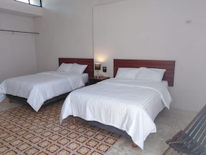 Suíte, 2 camas Queen | Wi-Fi de cortesia