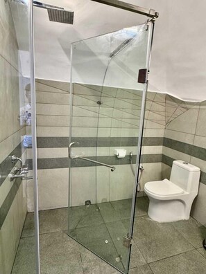 Premium Bungalow, Balcony, Sea View | Bathroom | Shower, free toiletries, towels, soap