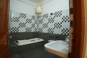 Family Studio Suite | Bathroom | Shower, free toiletries, towels, soap - Besillio Grand Hotel and Restaurant (Sundarnagar)