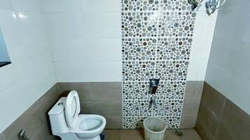 Shower, towels, soap, shampoo