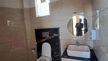 Shower, free toiletries, towels, soap