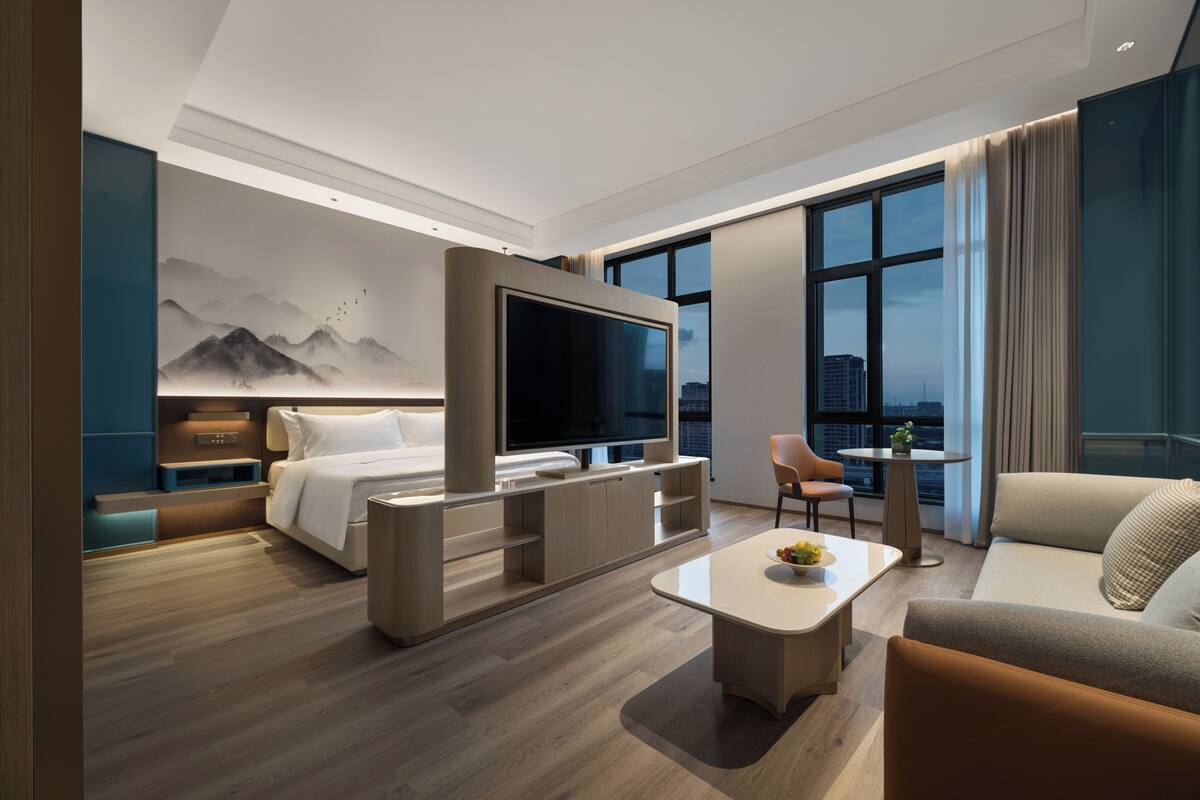 Desk, laptop workspace, blackout drapes, iron/ironing board