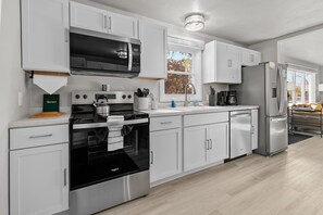 Fridge, microwave, oven, stovetop - Cheer & Chill - 4 BR Home Steps from Lambeau! (Green Bay)