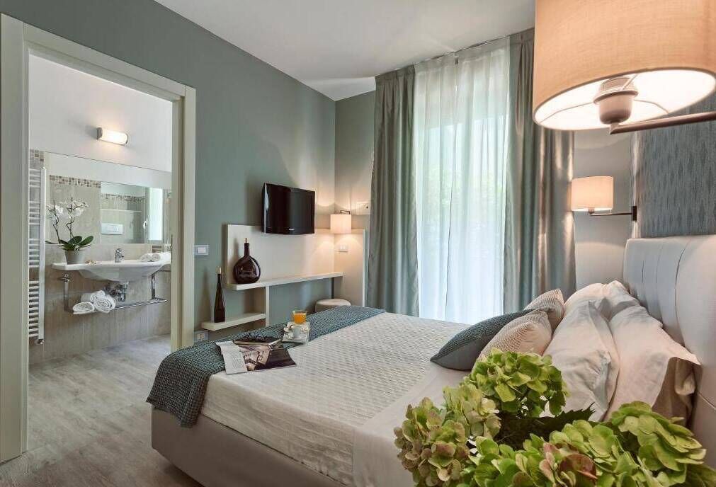 Chambre Familiale, balcon, vue mer | Coffres-forts dans les chambres, Wi-Fi gratuit