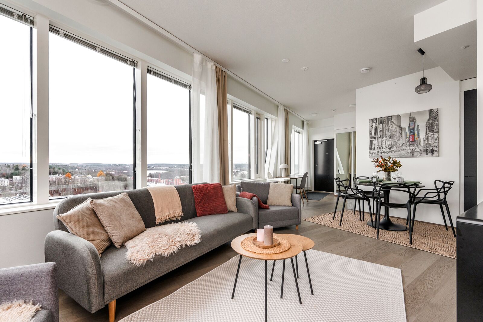 Deluxe Suite, Kitchen, City View | Living room | 55-inch flat-screen TV with cable channels