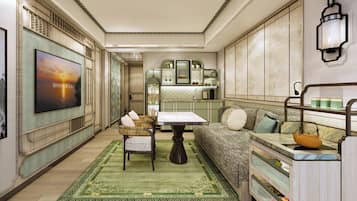 Suite « Premier », 1 très grand lit (Horizon) | Coin séjour | Télévision LCD de 50 pouces avec chaînes par câble