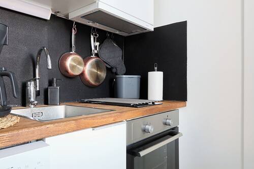 Apartment, City View | Private kitchen | Full-sized fridge, microwave, oven, stovetop