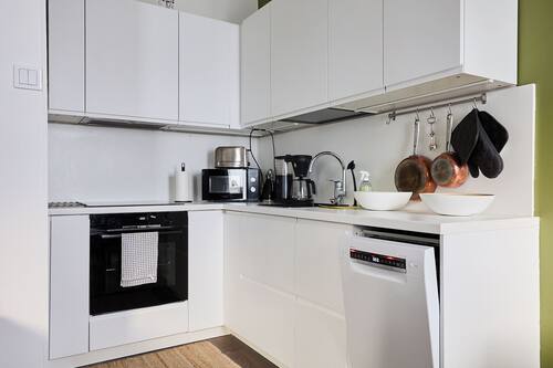 Apartment, City View | Private kitchen | Coffee/tea maker, electric kettle, high chair