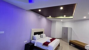 Family Room, Balcony, Pool View - plumeria resort (Kushalnagar)