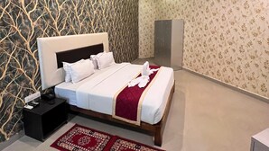 Family Room, Balcony, Pool View - plumeria resort (Kushalnagar)