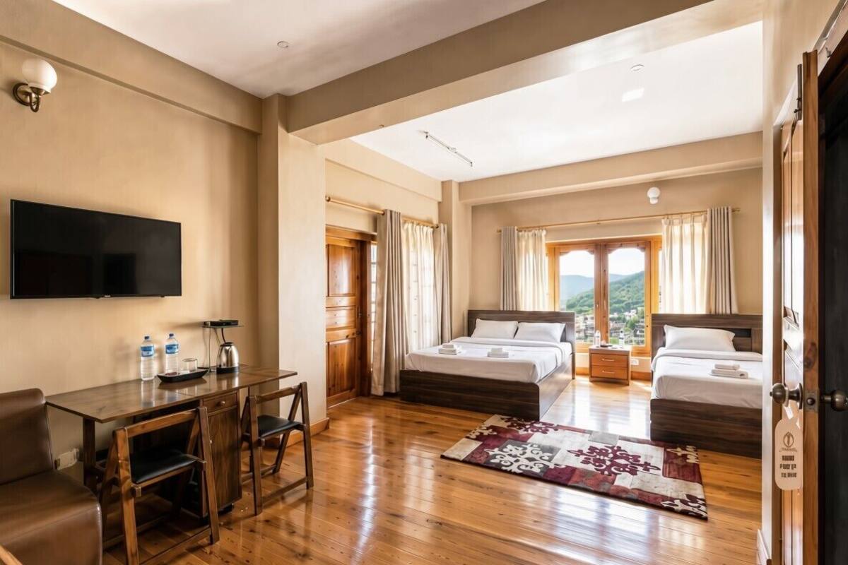 Family Studio Suite, 2 Queen Beds, City View | Laptop workspace, individually furnished, bed sheets