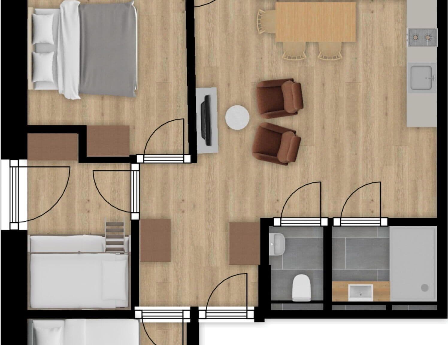 A hotel room layout with a bed, two chairs, a small table, a TV, and a bathroom.