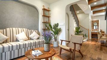 Deluxe Villa, 3 Bedrooms | Living area | 65-inch LED TV with cable channels, streaming services