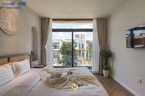 Deluxe Villa, 3 Bedrooms, Pool View | Desk, laptop workspace, free WiFi, bed sheets - Life Travel Villa - Novaworld Phan Thiet (Phan Thiet)