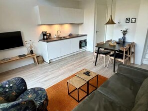 Apartment | Living room - Beautiful Lodge Located on the Church Square (Zoutelande)