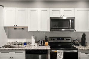 Fridge, microwave, oven, stovetop - CozySuites Chic 1BR in Downtown Pitts #2 (Pittsburgh)