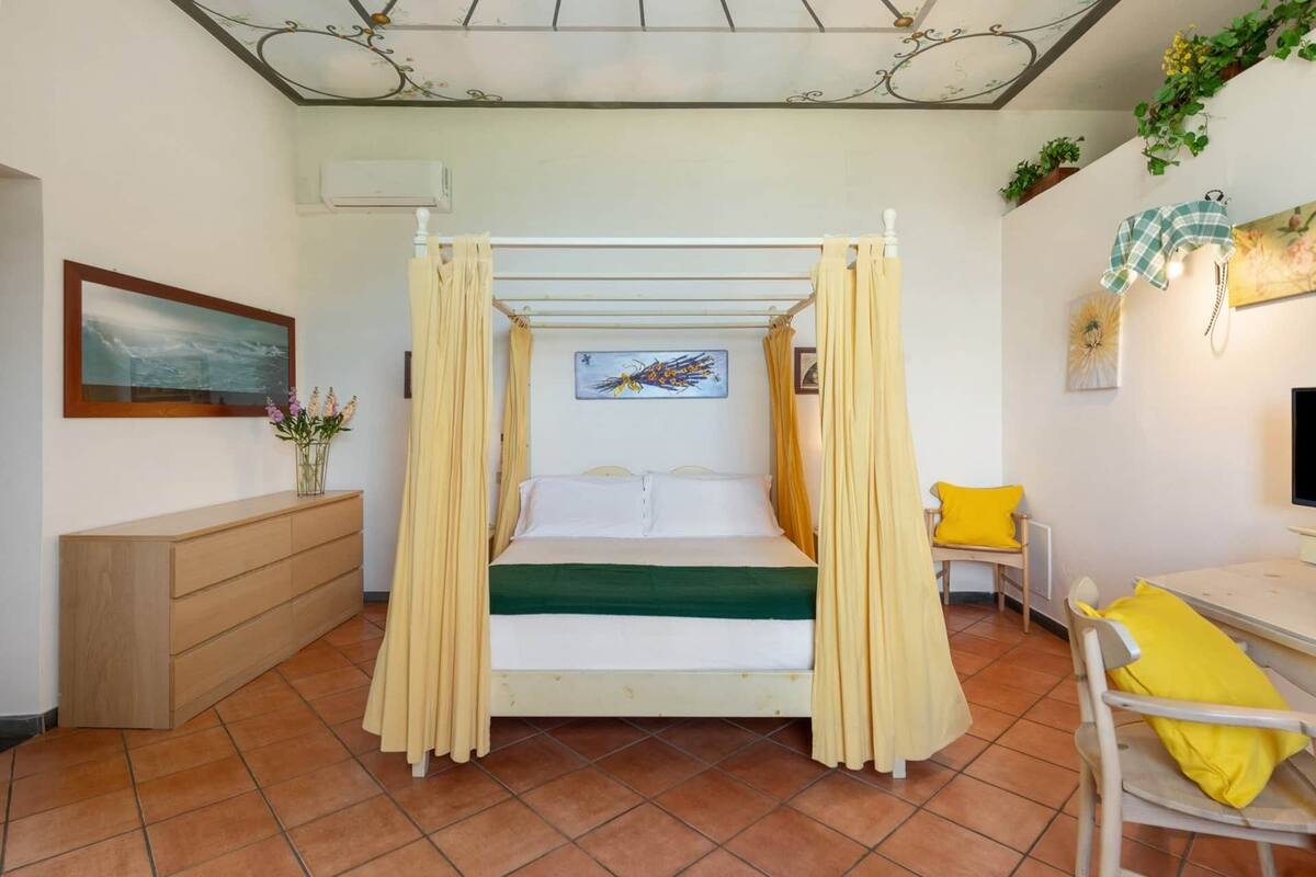 Junior Quadruple Room, Mountain View | Blackout drapes, iron/ironing board, free WiFi