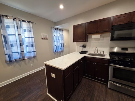 Private kitchen. Cozy 5-bedroom Family-Friendly Haven, With 3 full Bathrooms.
