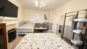 Deluxe Triple Room, Bay View | Iron/ironing board, free WiFi