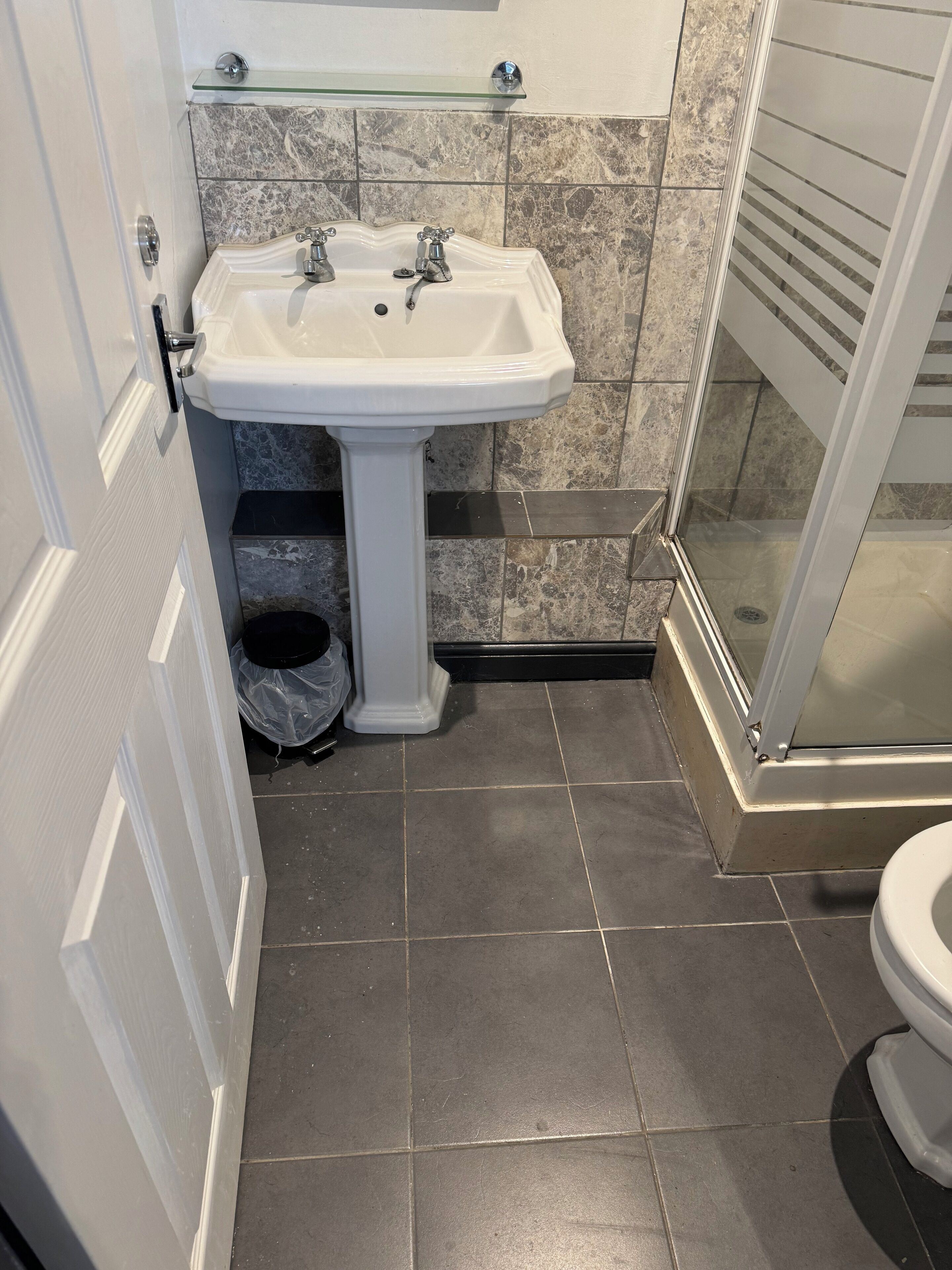 Shower, towels, toilet paper