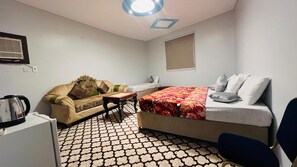 Classic Quadruple Room, City View | Free WiFi