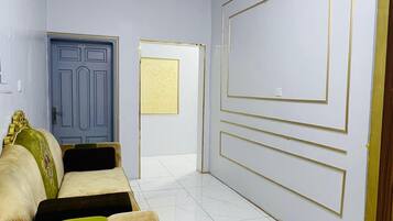 Quadruple Room | Living area