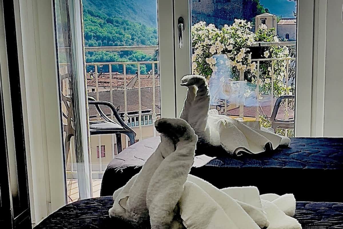 Deluxe Triple Room, Balcony, Mountain View | Desk, iron/ironing board (on request), WiFi (free)