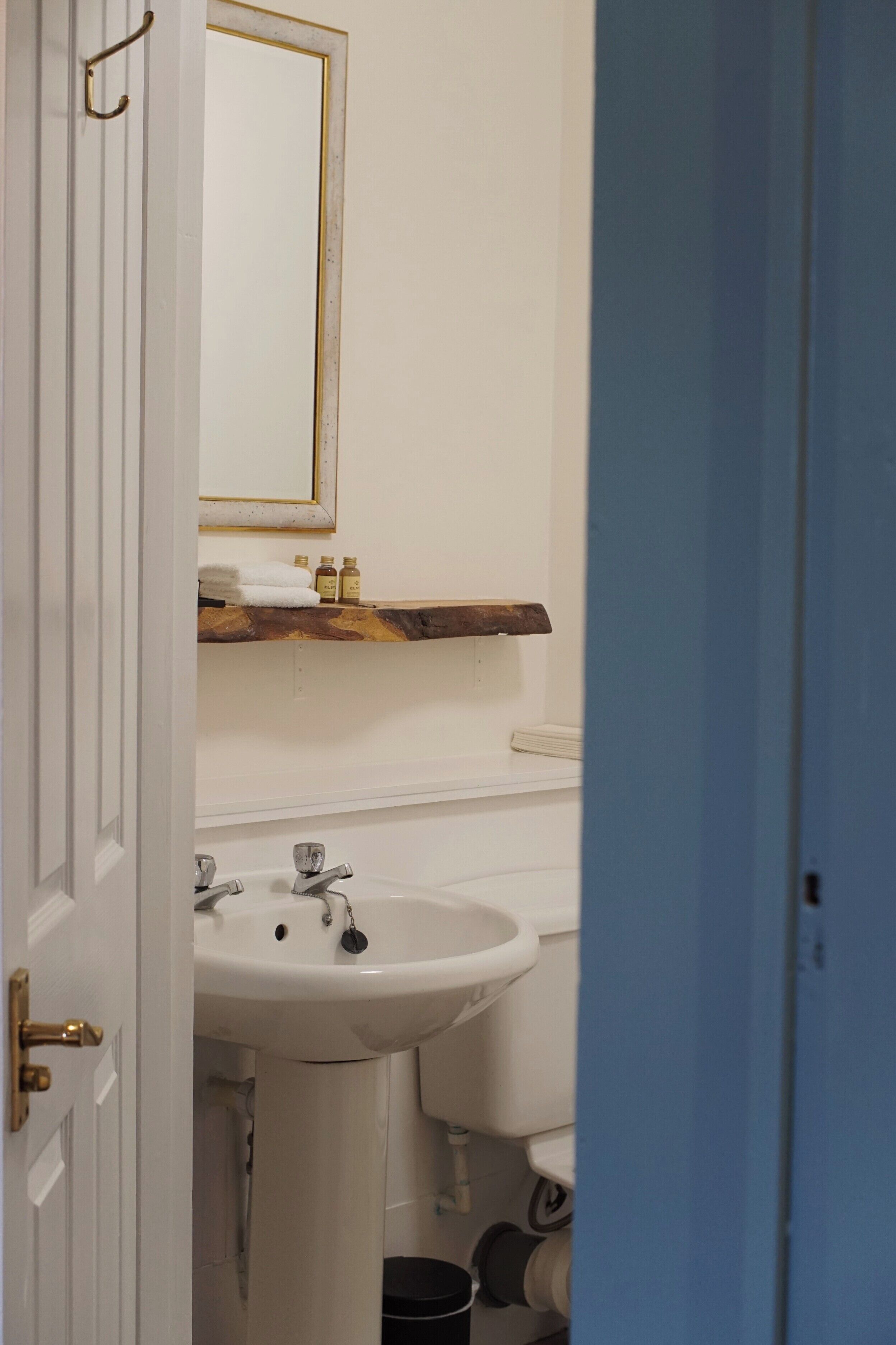 Shower, towels, soap, shampoo