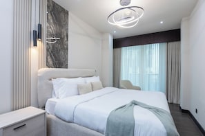 Apartment, Balcony, City View | Iron/ironing board, free WiFi - Stylish 2BR Business Bay Pool Access (Dubai)