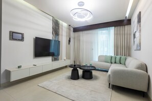 Living room - Stylish 2BR Business Bay Pool Access (Dubai)