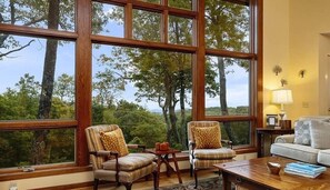 TV, fireplace - Escape to Breathtaking View Retreat at Wintergreen a stunning 3-bedroom, 4-bath mountain home with three incredible decks, cozy fireplace, grill and patio area, and breathtaking Blue Ridge views perfect for families and kids! (Wintergreen Resort)