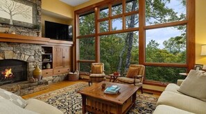 TV, fireplace - Escape to Breathtaking View Retreat at Wintergreen a stunning 3-bedroom, 4-bath mountain home with three incredible decks, cozy fireplace, grill and patio area, and breathtaking Blue Ridge views perfect for families and kids! (Wintergreen Resort)