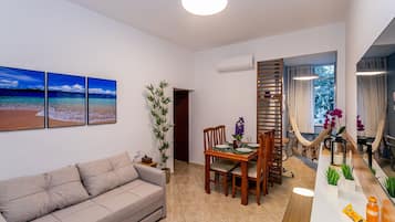 Comfort Apartment | Living area | Flat-screen TV