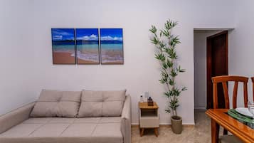Comfort Apartment | Living area | Flat-screen TV