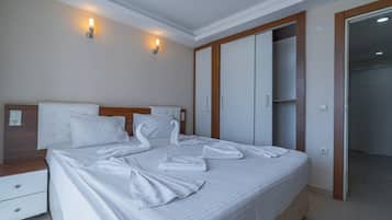 Suite | Coffres-forts dans les chambres, Wi-Fi gratuit